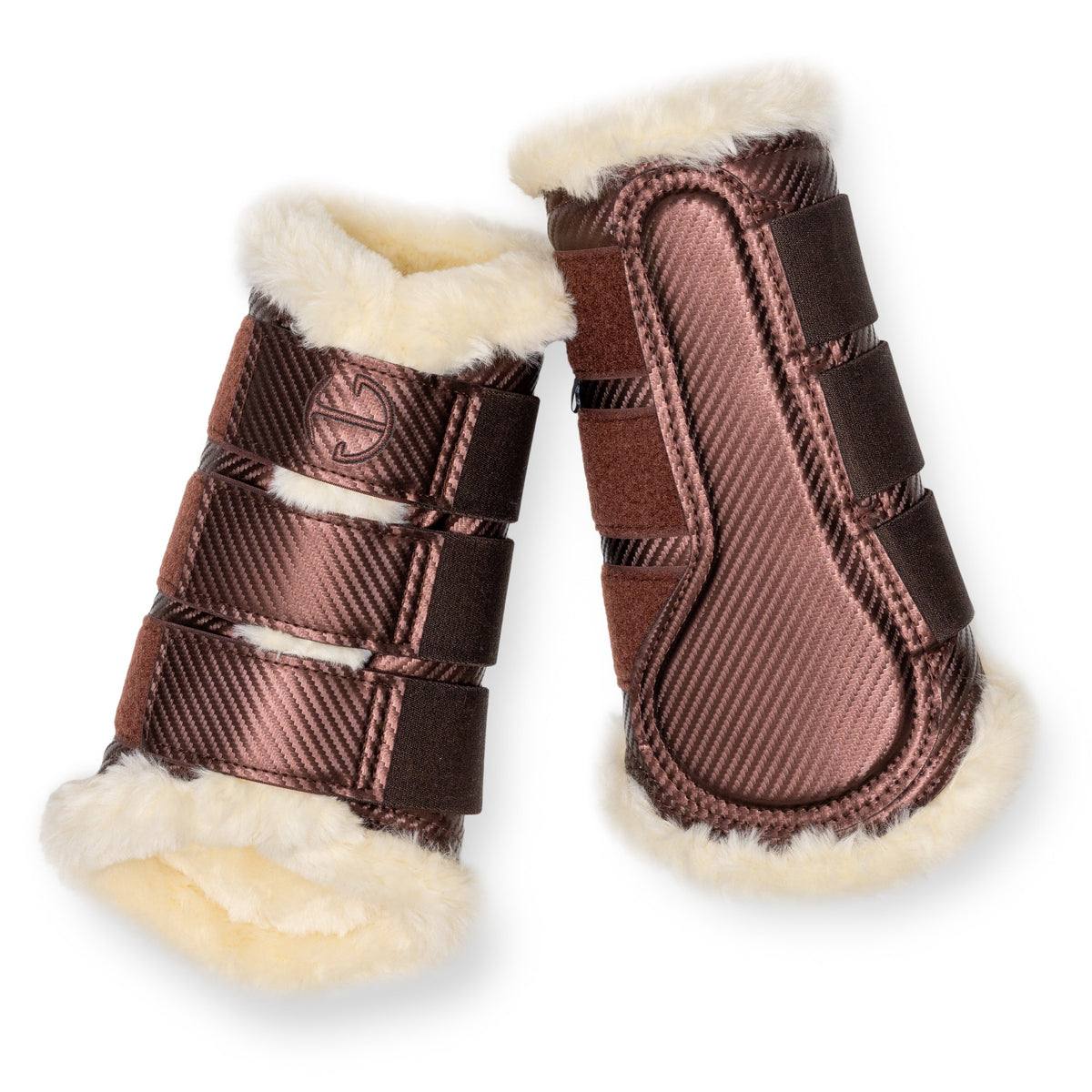 Pair of brown horse brushing boots with natural fur lining on a white background