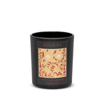 A refined winter candle with cinnamon bark, chai spice, and ambered cream. Hand poured soy candle in a matte black vessel. Vegan, cruelty free, and clean burning.